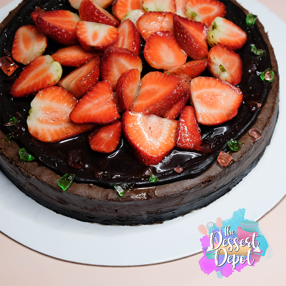 Triple Chocolate Cheesecake (w/ macerated strawberries)